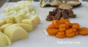 Add chopped potato, carrot, mushroom and sausage